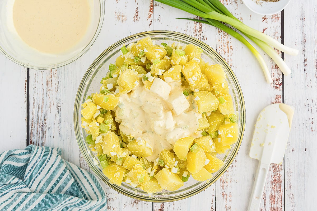 dressing added to potato salad mixture