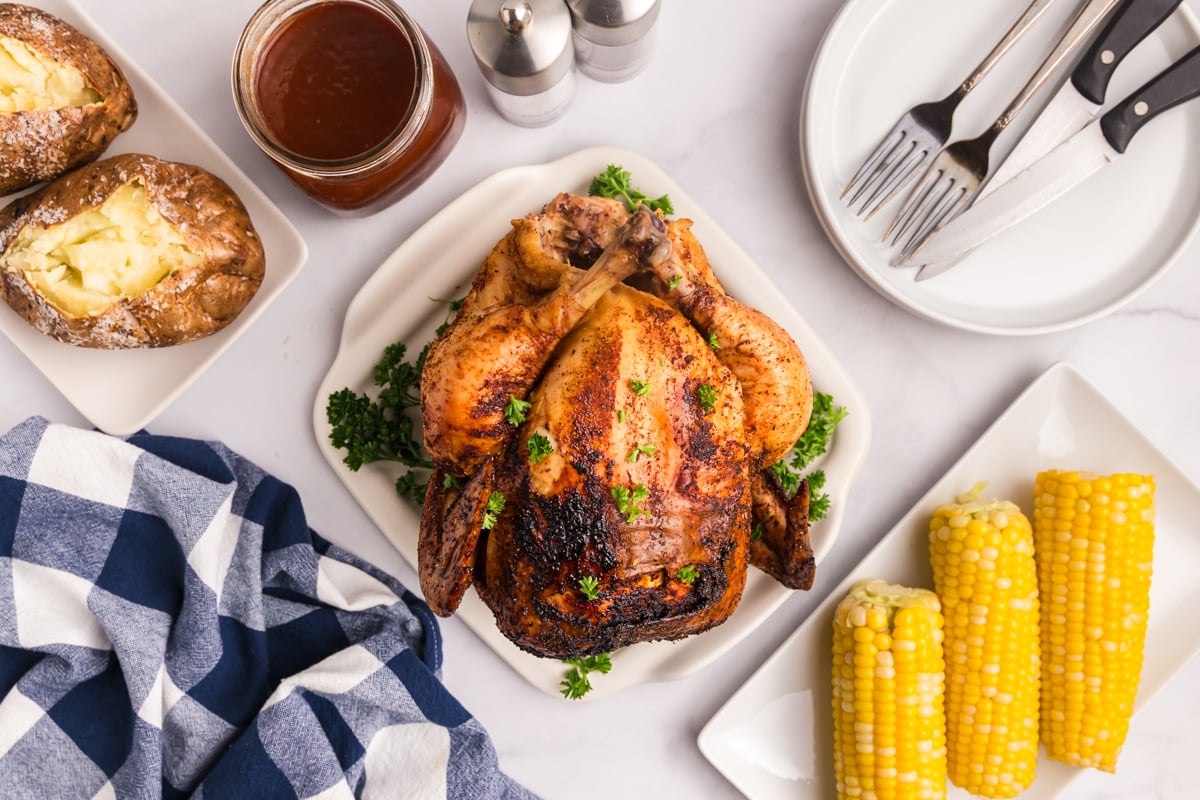 overhead shot of whole chicken topped with cola bbq sauce