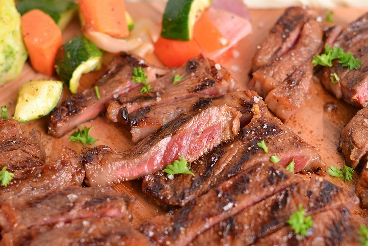 close up angled shot of sliced denver steak