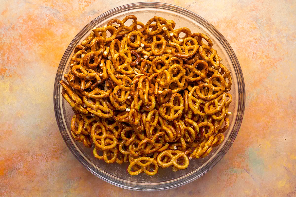 ranch dill mixture poured over bowl of pretzels