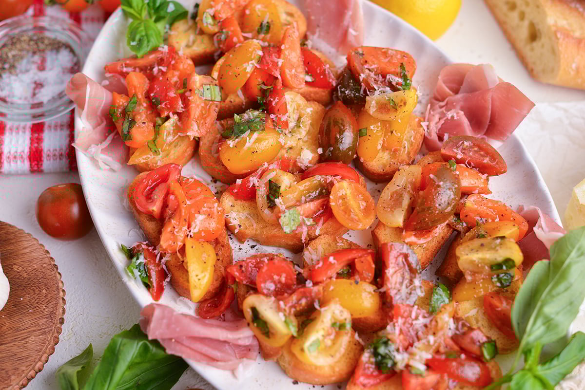angled shot of platter of tomato bruschetta
