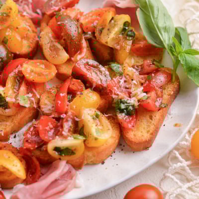 angled shot of platter of tomato bruschetta