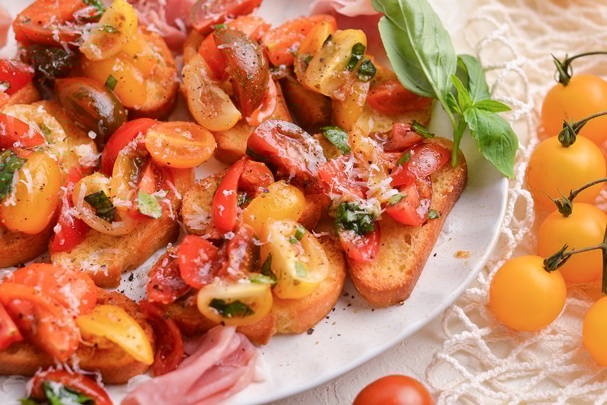 angled shot of platter of tomato bruschetta