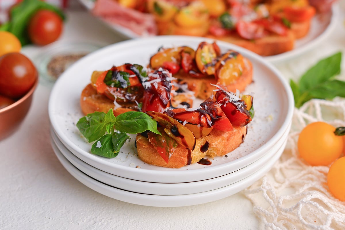 angled shot of plate of tomato bruschetta