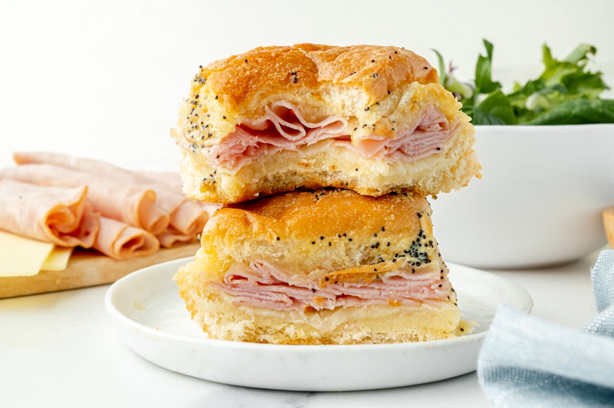 bite taken out of stack of ham and cheese sliders