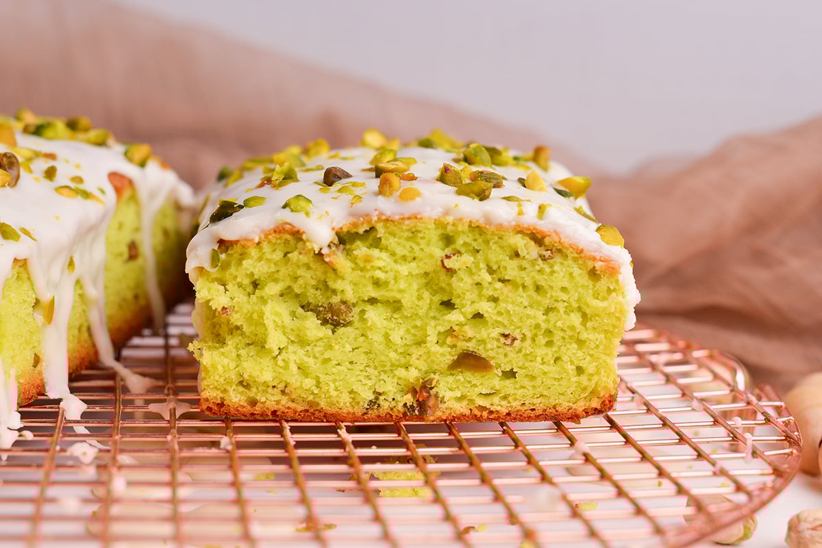 straight on shot of pistachio loaf sliced