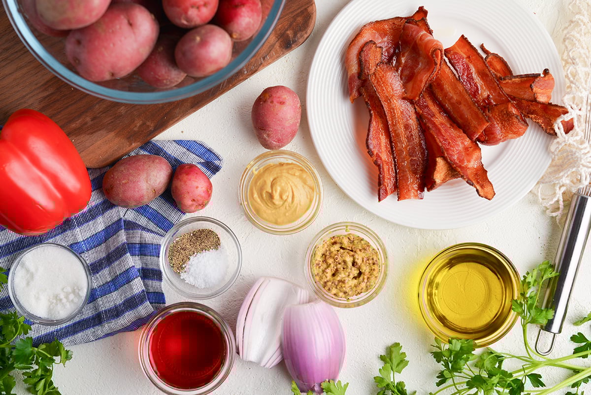 overhead shot of warm german potato salad ingredients