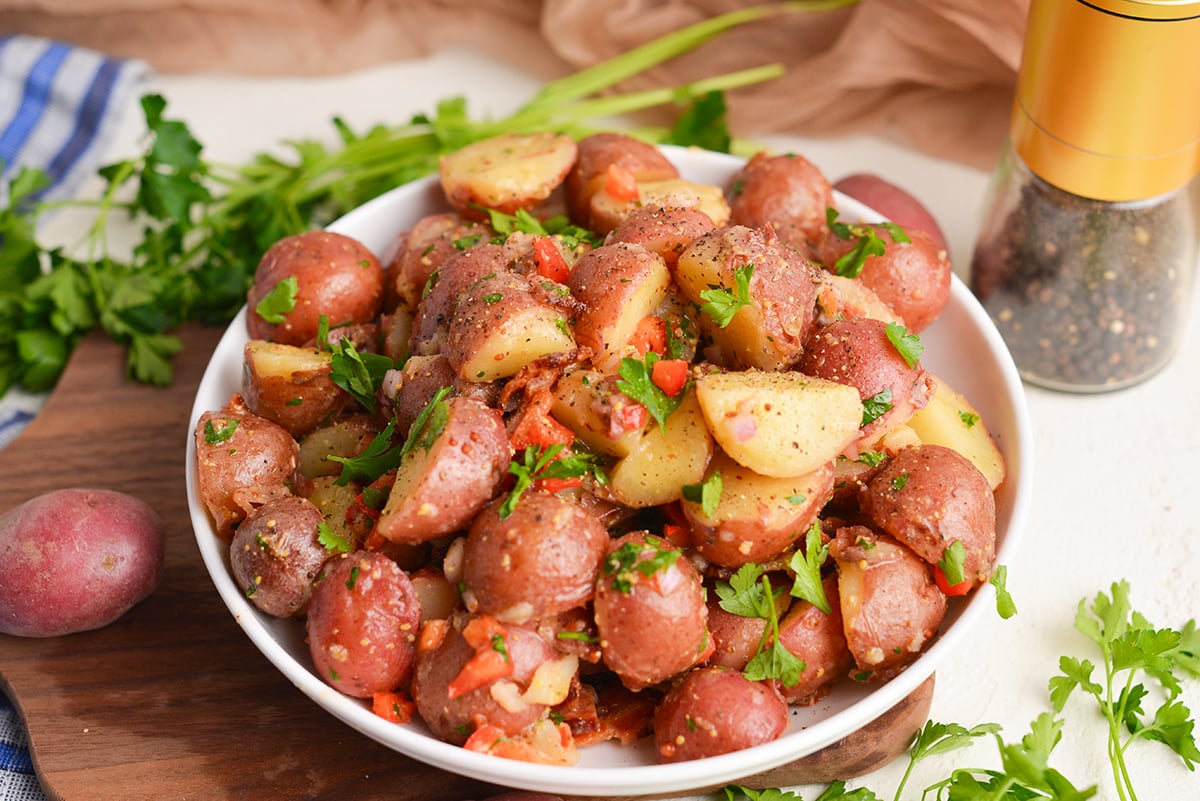 angled shot of bowl of german potato salad