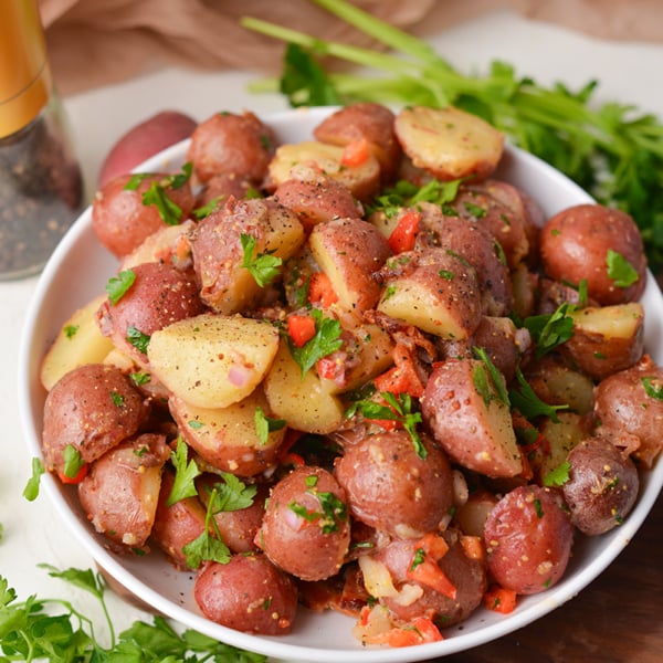angled shot of bowl of no mayo potato salad