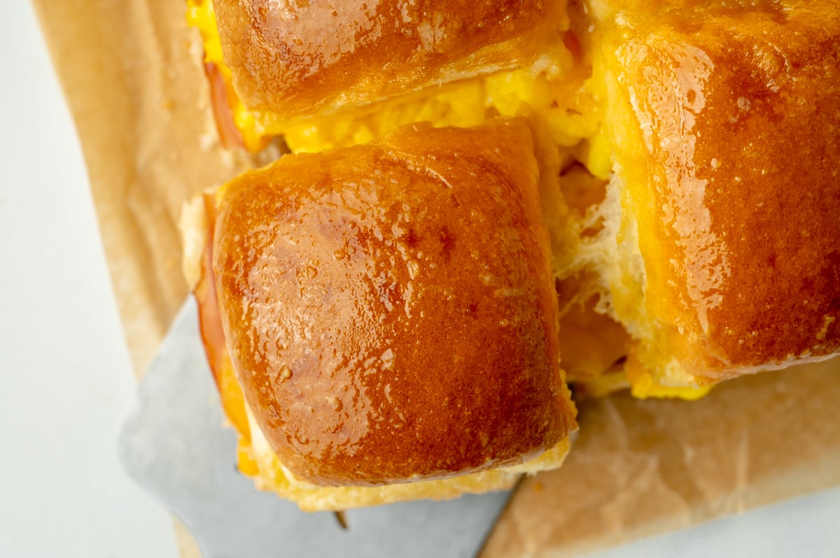 overhead shot of one breakfast slider pulling apart from others