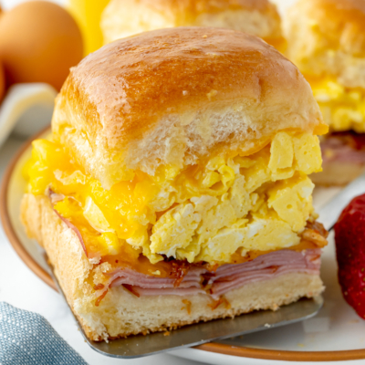 angled shot of breakfast slider on plate with strawberry