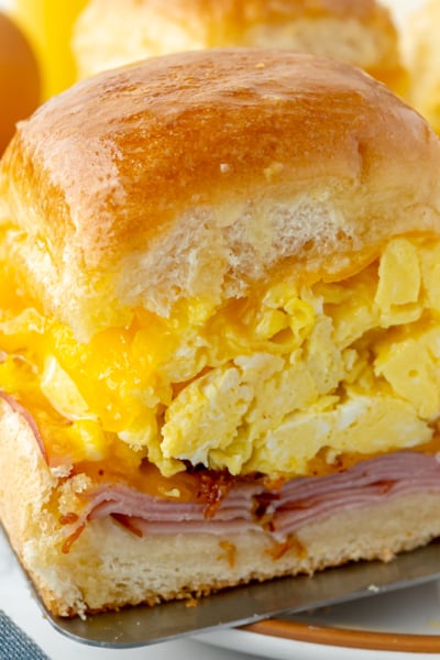 angled shot of breakfast slider on plate with strawberry