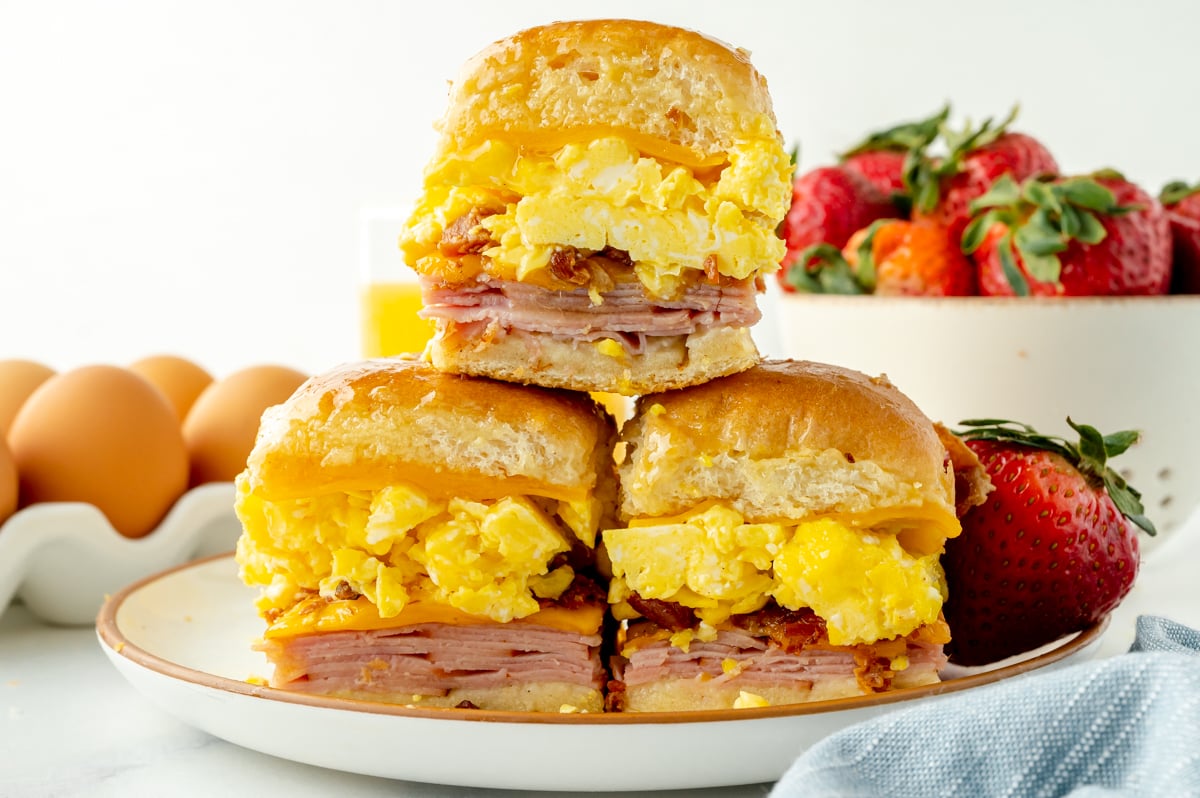 straight on shot of stack of three breakfast sliders on plate