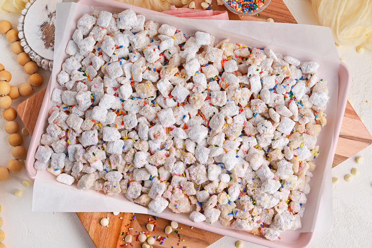 overhead shot of tray of cake batter puppy chow