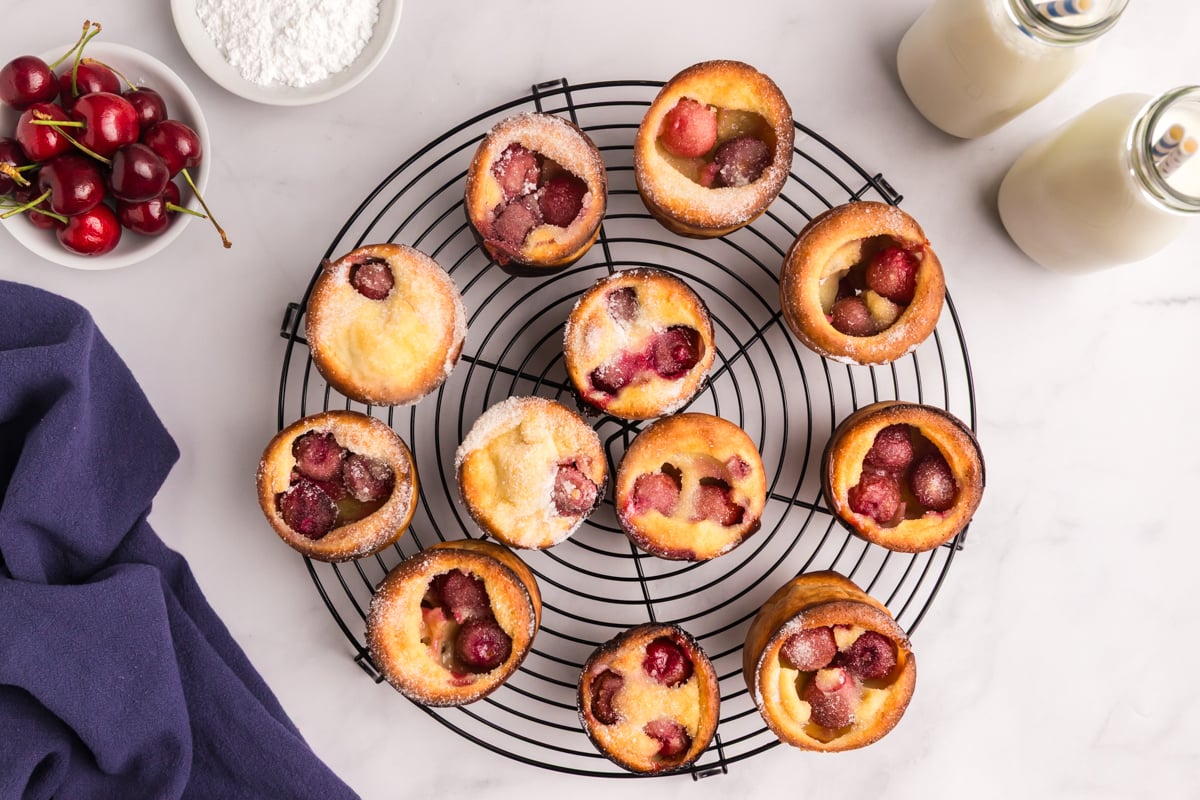 overhead shot of cherry popovers on cooling rack