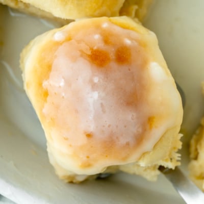 close up overhead shot of coconut roll on spatula