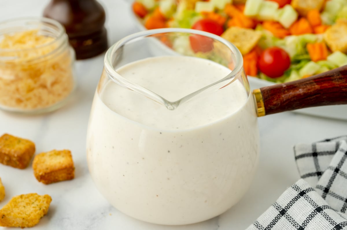 angled shot of Parmesan Peppercorn Dressing in jar