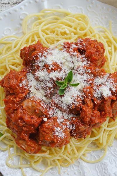 overhead shot of plate of homemade spaghetti and meatballs