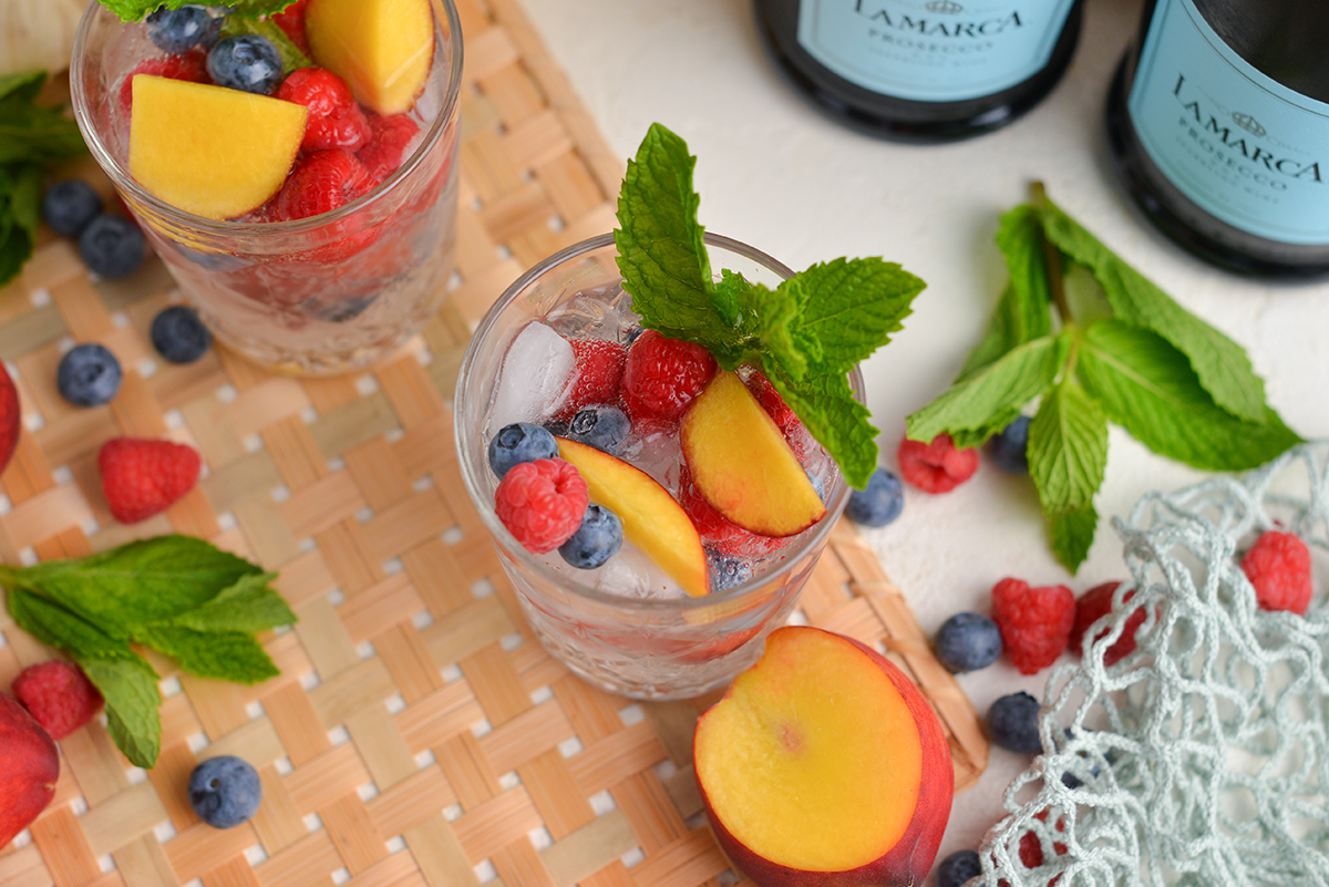 angled shot of peach sangria in glass