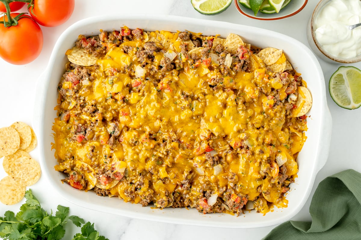 overhead shot of baked taco bake casserole in casserole dish