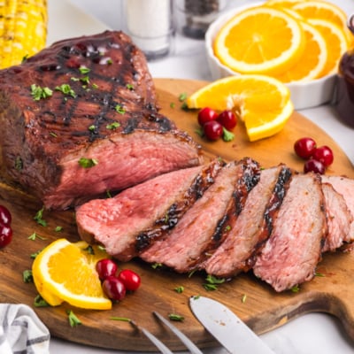 sliced tri-tip roast on board