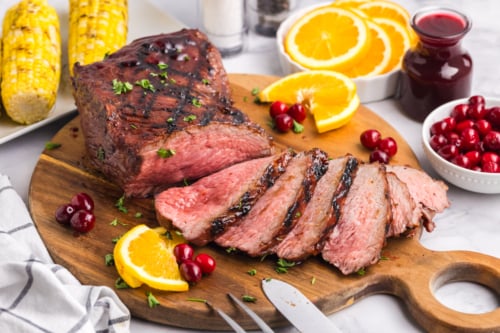 sliced tri-tip roast on board