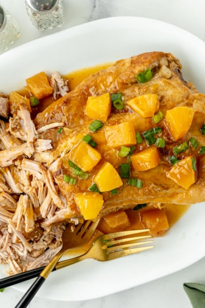 overhead shot of hawaiian pork loin shredded on platter
