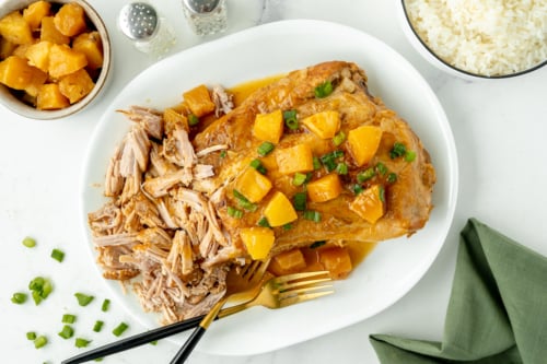 overhead shot of hawaiian pork loin shredded on platter