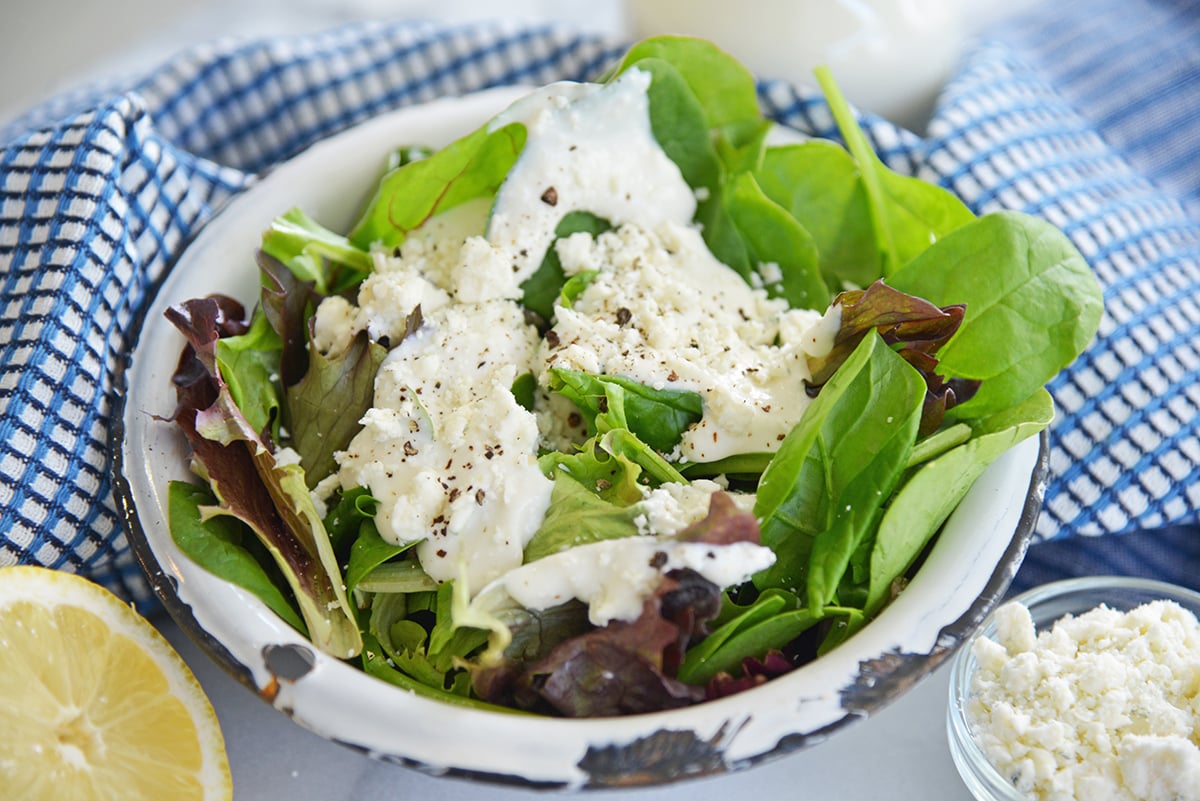blue cheese dressing on a green salad