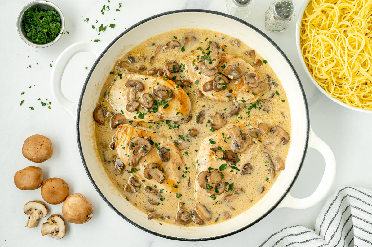 overhead shot of chicken marsala in a pan