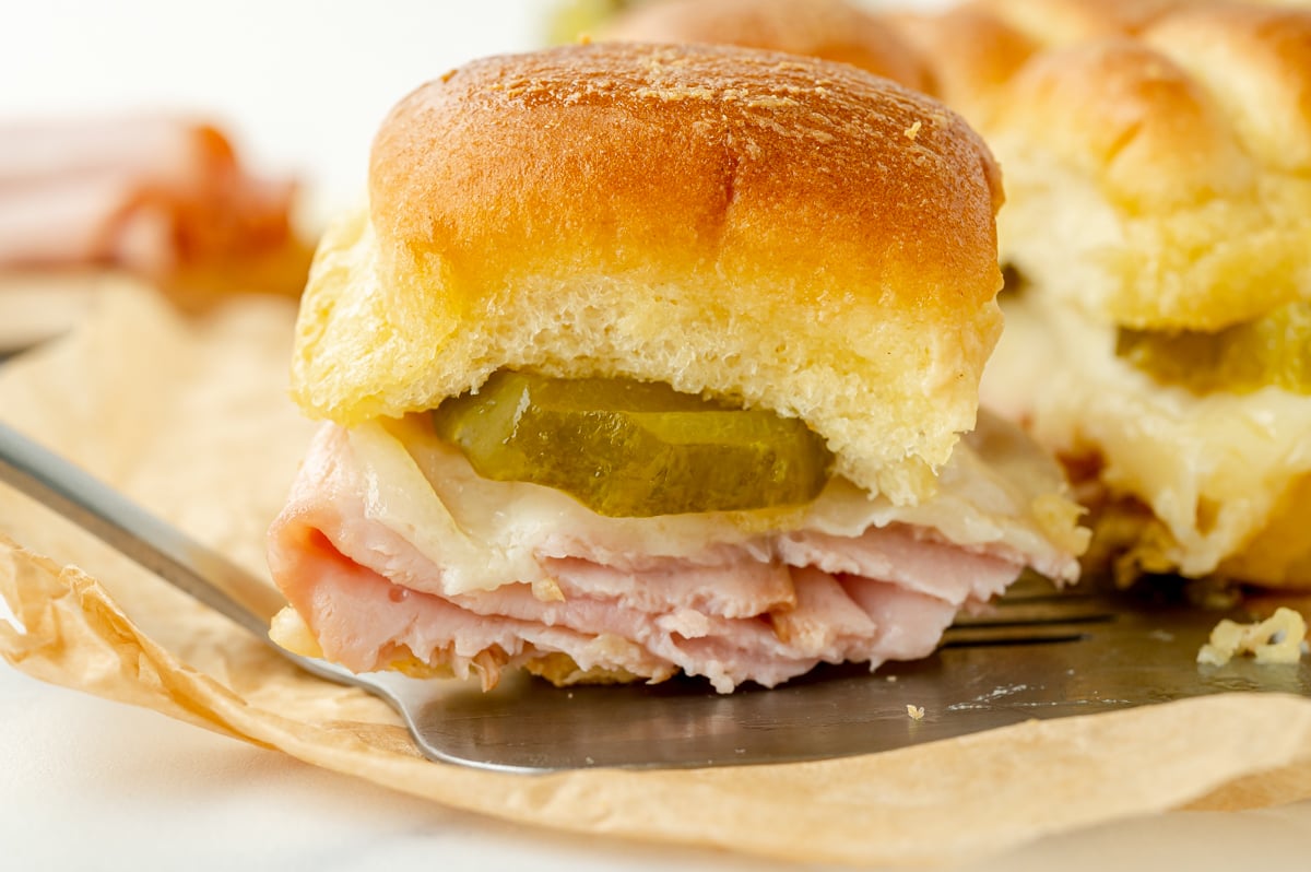 side shot of cuban slider on spatula