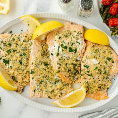 overhead shot of platter of garlic butter salmon
