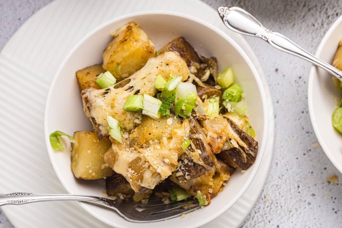 overhead shot of bowl of slow cooker cheesy potatoes