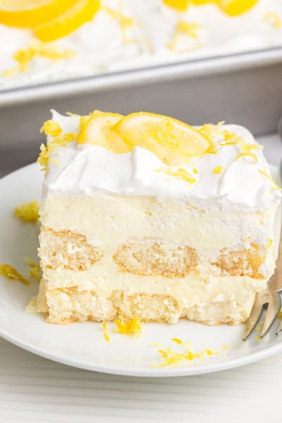 slice of lemon tiramisu on plate with fork