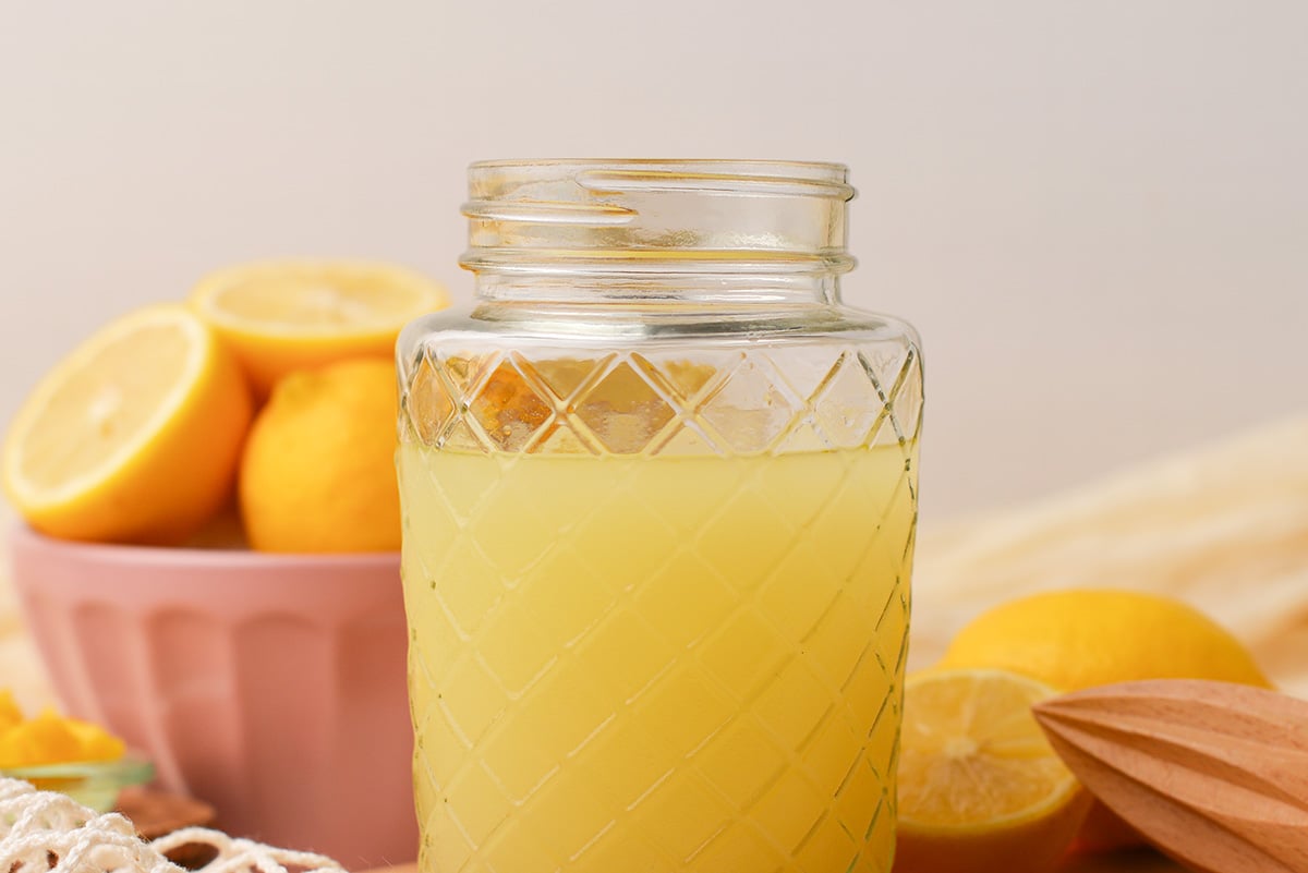 close up straight on shot of jar of limoncello