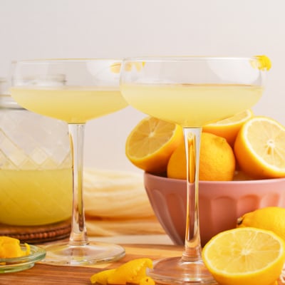 straight on shot of two goblets of homemade limoncello