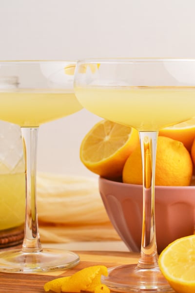 straight on shot of two goblets of homemade limoncello