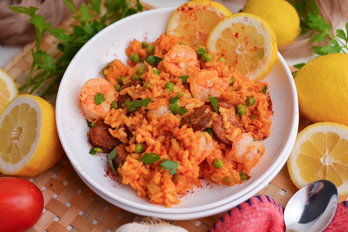 angled shot of plate of shrimp and sausage paella