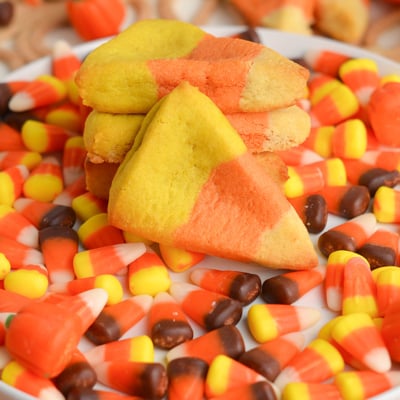 stack of cookies on plate of candy corn