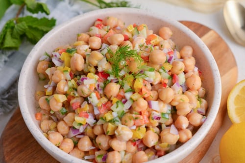 angled shot of bowl of chickpea salad