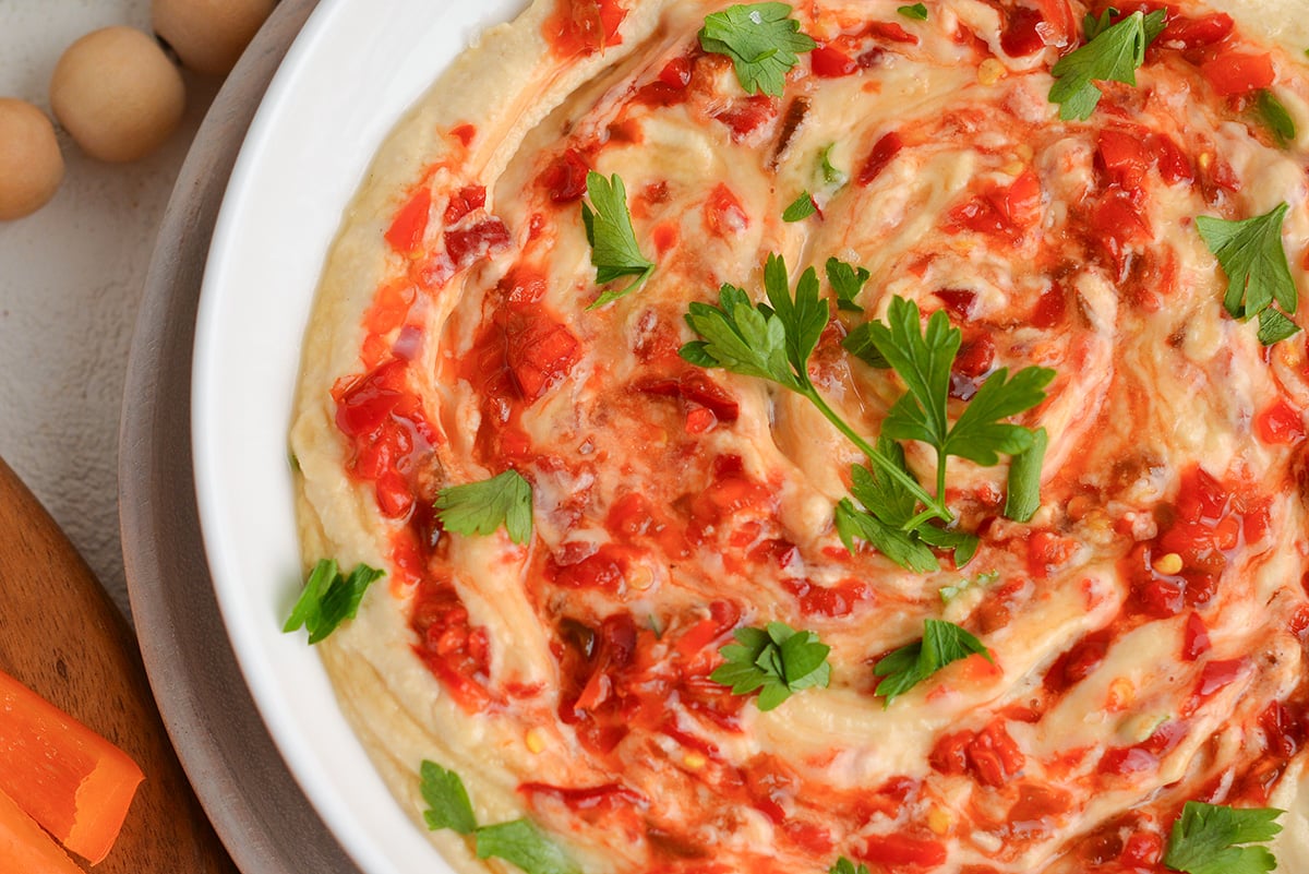 close up overhead shot of bowl of hot honey hummus