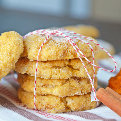 straight on shot of stack of pumpkin sugar cookies