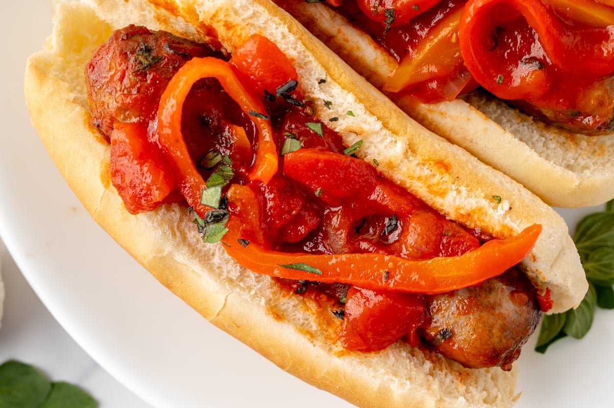 overhead shot of italian sausage and peppers sandwich