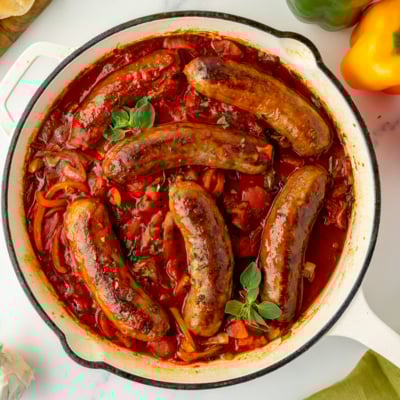 overhead shot of pan of italian sausage and peppers