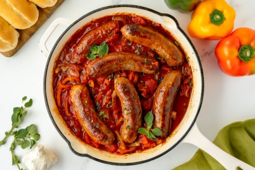 overhead shot of pan of italian sausage and peppers