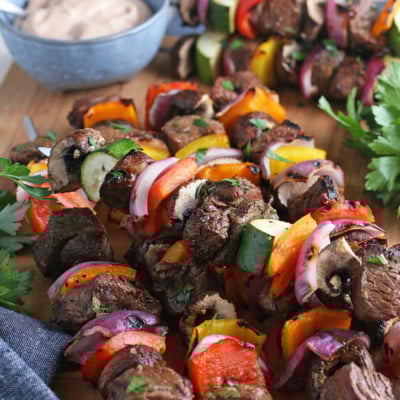 angle view of steak kabobs with vegetables