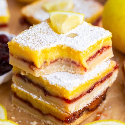 bite taken out of stack of lemon cranberry bars