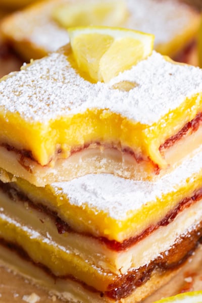 bite taken out of stack of lemon cranberry bars