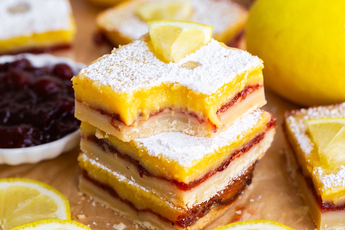 bite taken out of stack of lemon cranberry bars
