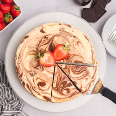 overhead shot of sliced marble cheesecake